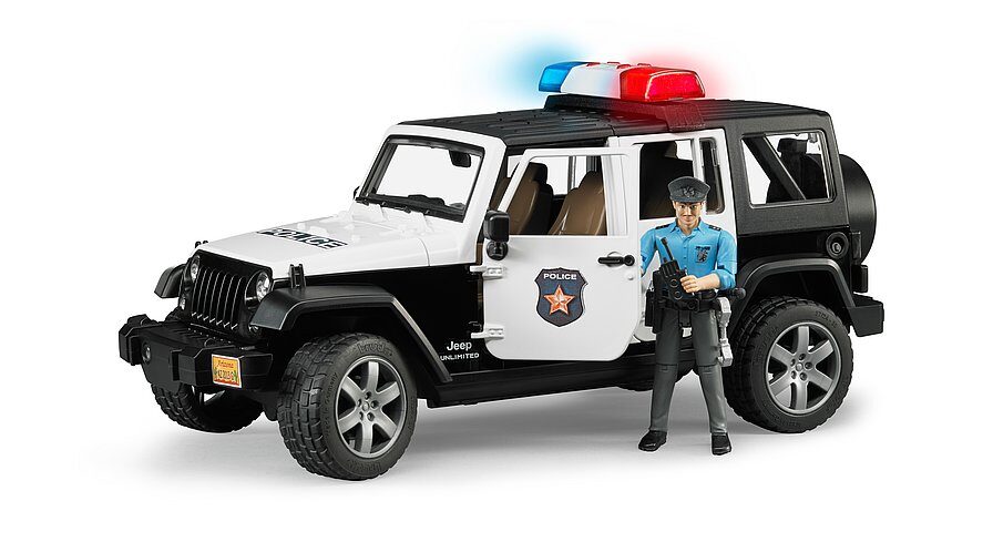 Jeep Wrangler Unlimited Rubicon Police transportlīdzeklis ar policistu un piederumiem BRUDER (02526)